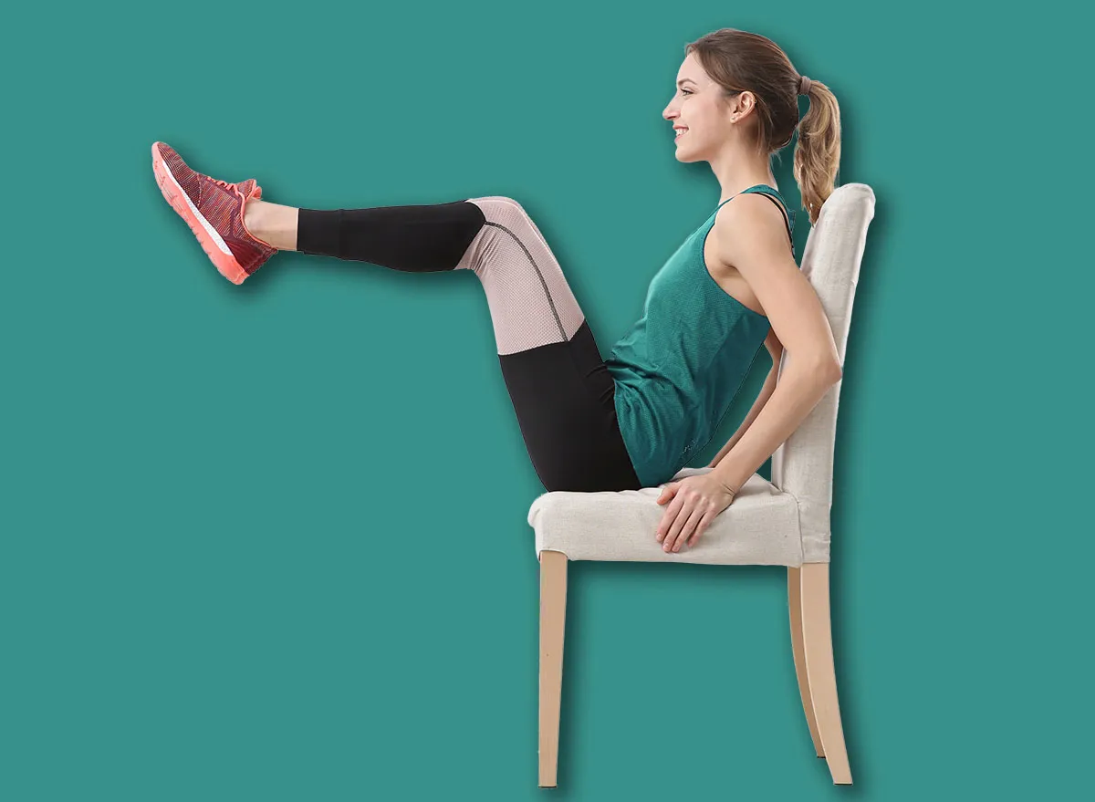 5 Chair Exercises to Flatten Lower Belly Overhang After 60, According to a Trainer